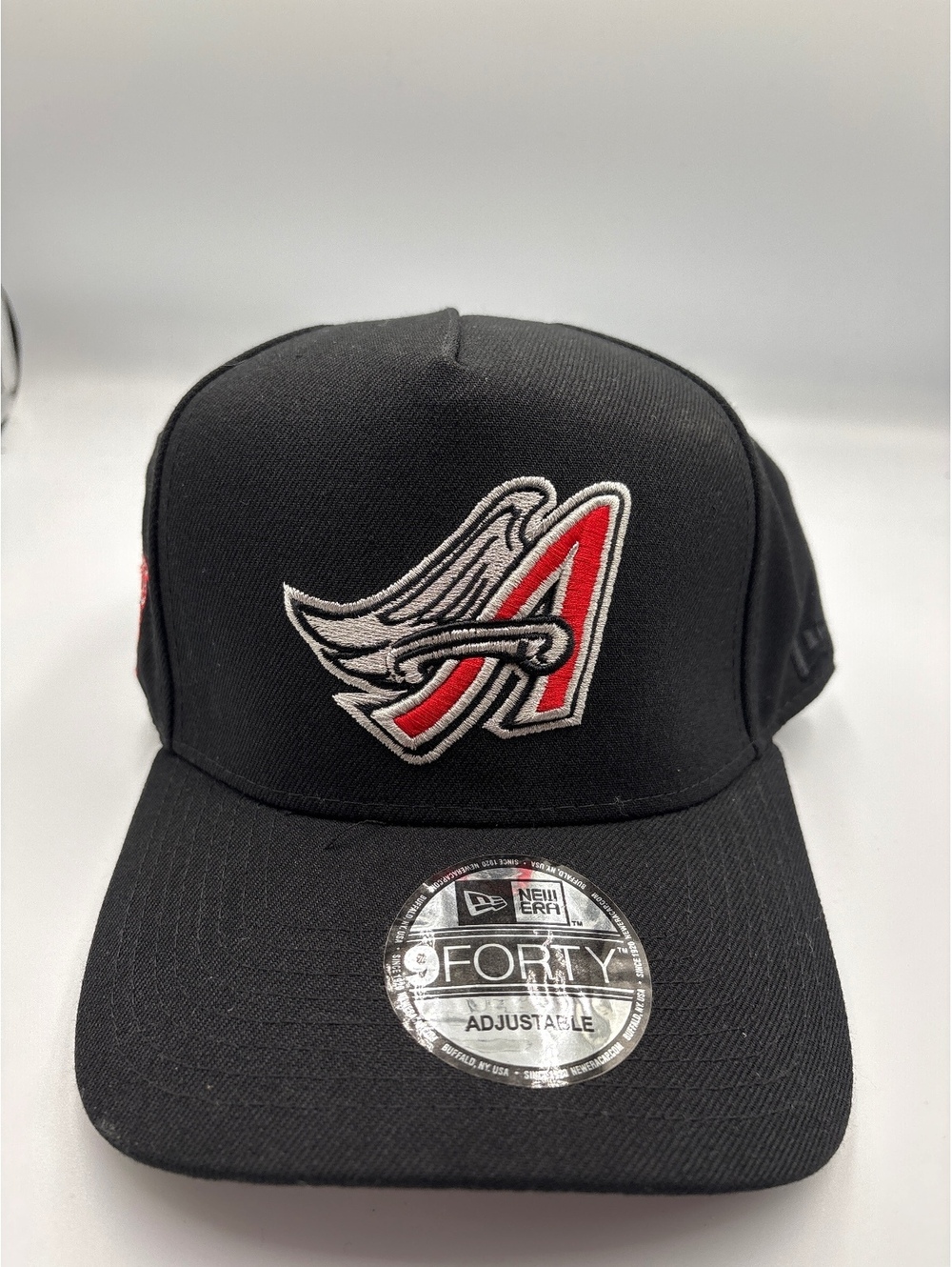 New Era 9FORTY Adjustable Black Baseball Cap with Red and White Logo